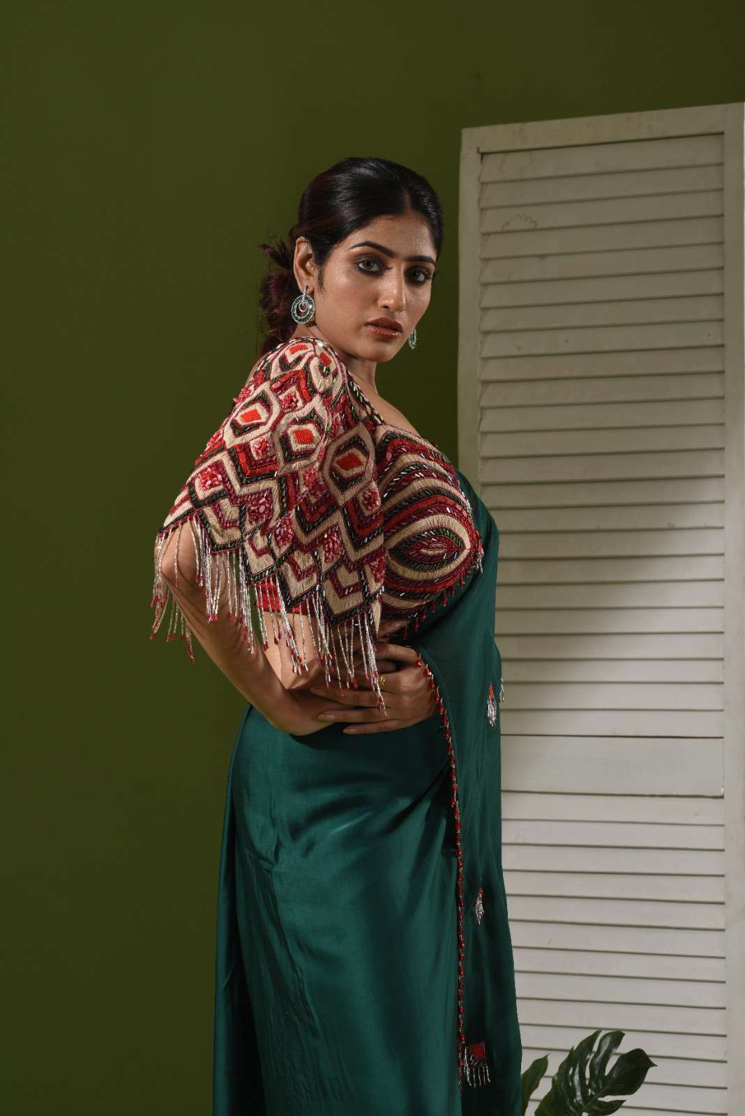 One side heavy embroidered blouse, pull up skirt and drape
