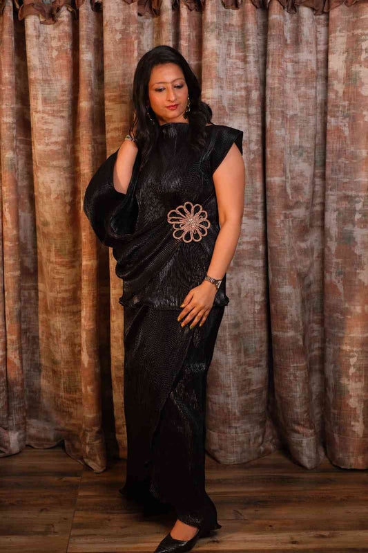 Asymmetrical draped top with statement sleeve and skirt