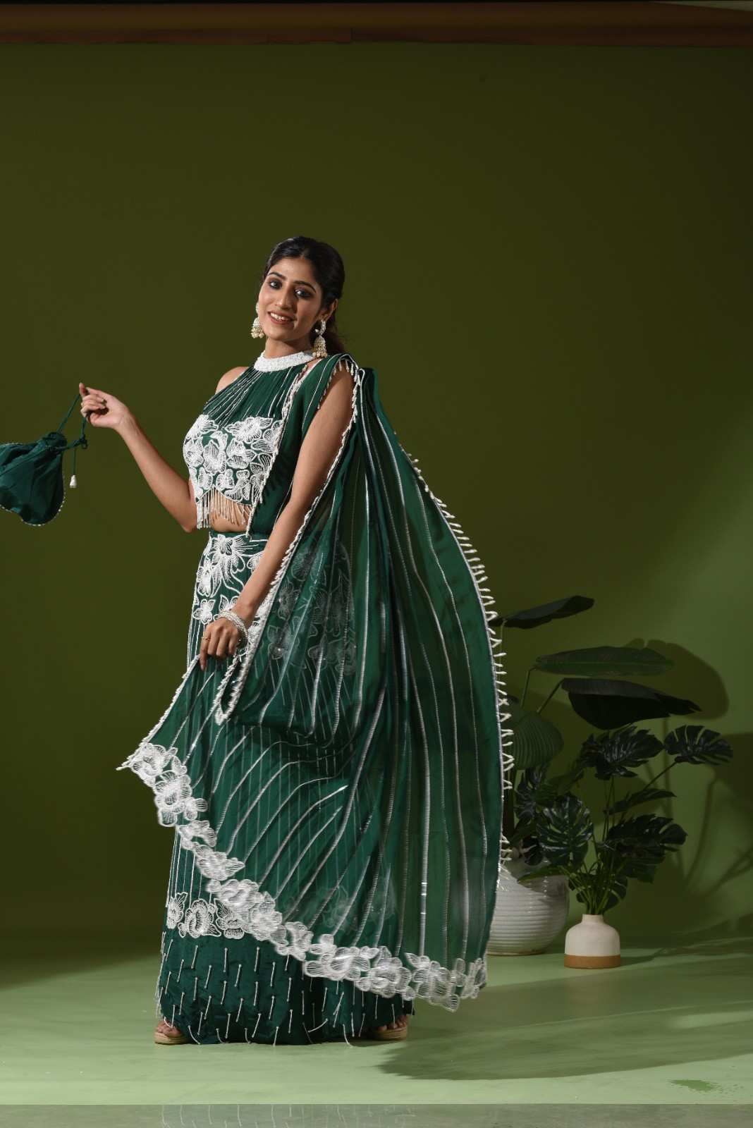 Heavy embroidered mermaid lehenga and potli bag