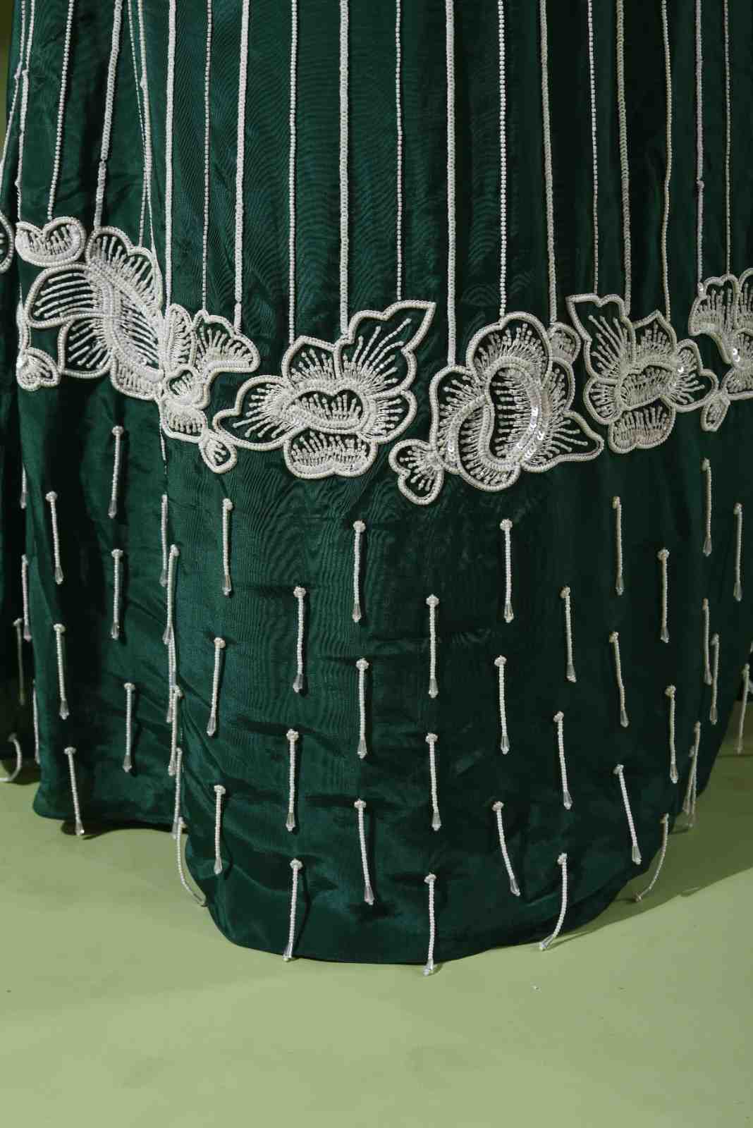 Heavy embroidered mermaid lehenga and potli bag