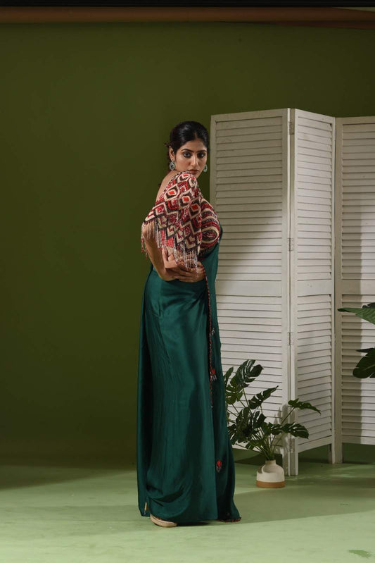 One side heavy embroidered blouse, pull up skirt and drape