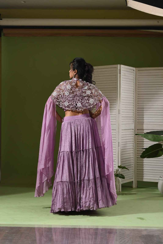 Crystal embroidered cape, bustier and multi layered lehenga