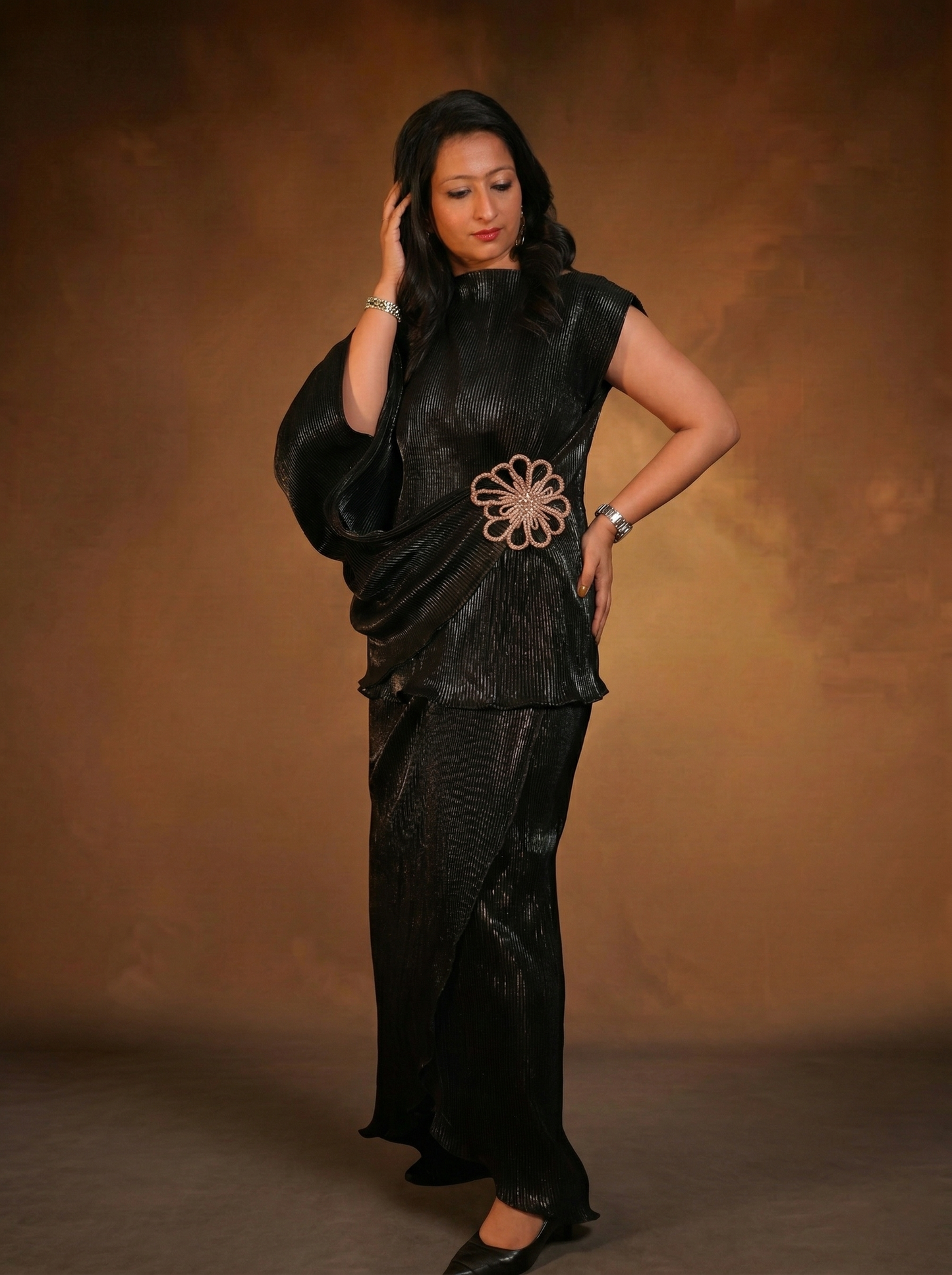 Asymmetrical draped top with statement sleeve and skirt