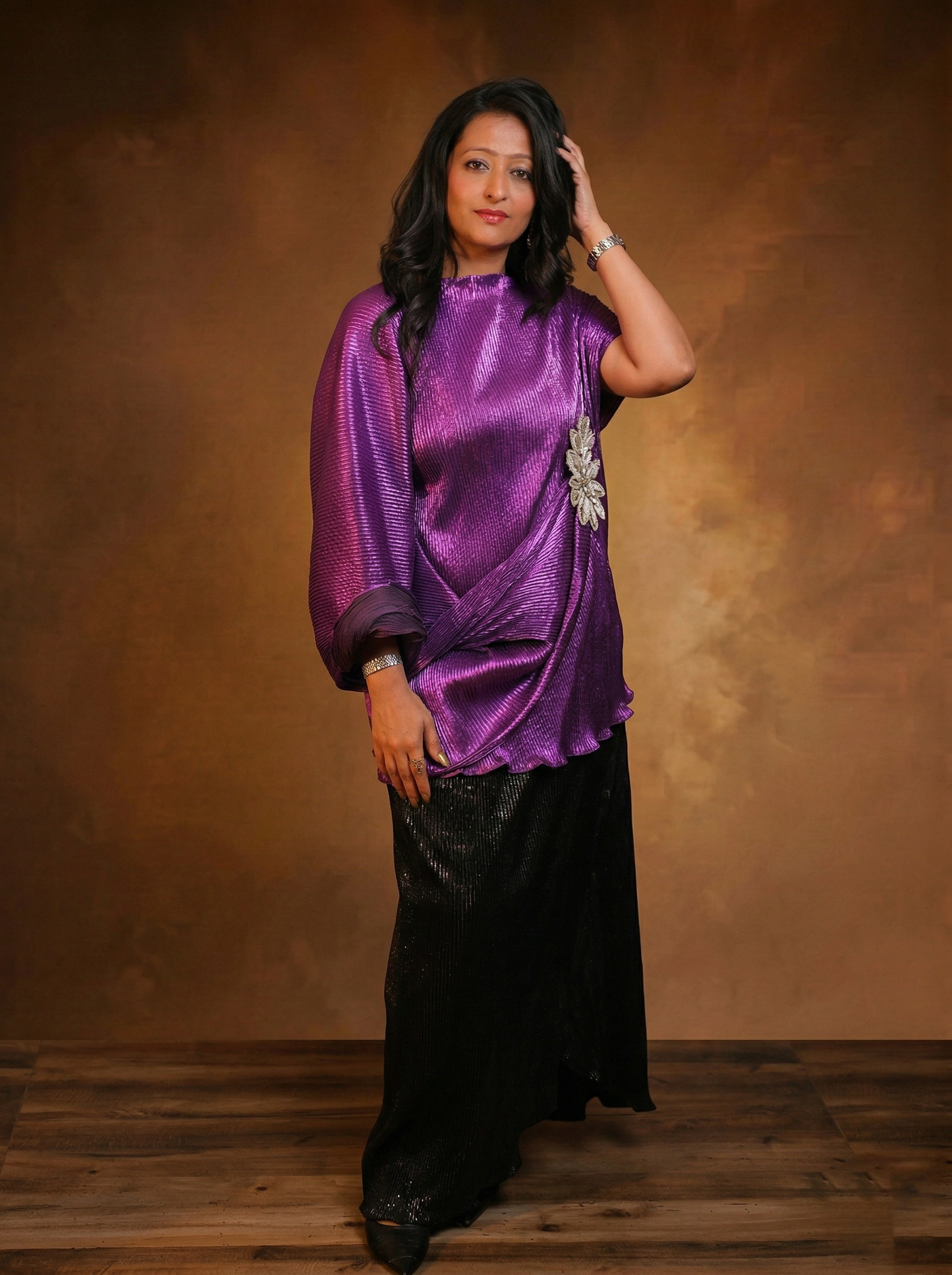 Asymmetrical draped top with statement sleeve and skirt