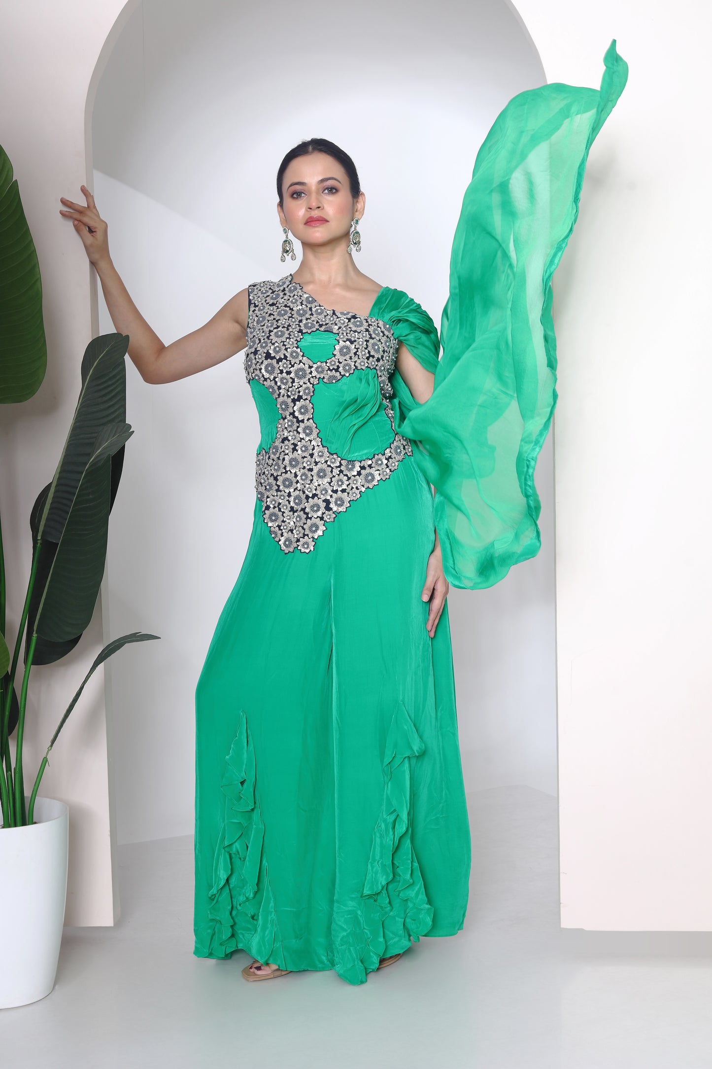 Green jumpsuit with embroidered panel
